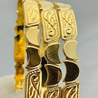 Bracelet en or massif avec motifs floraux