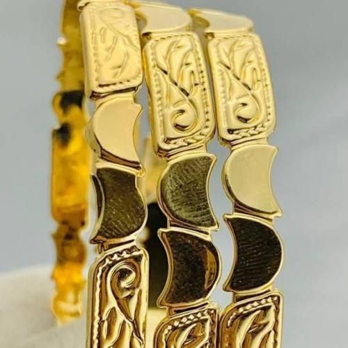 Bracelet en or massif avec motifs floraux