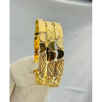 Bracelet en or massif avec motifs floraux