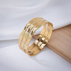 Bracelet en or massif avec motifs floraux